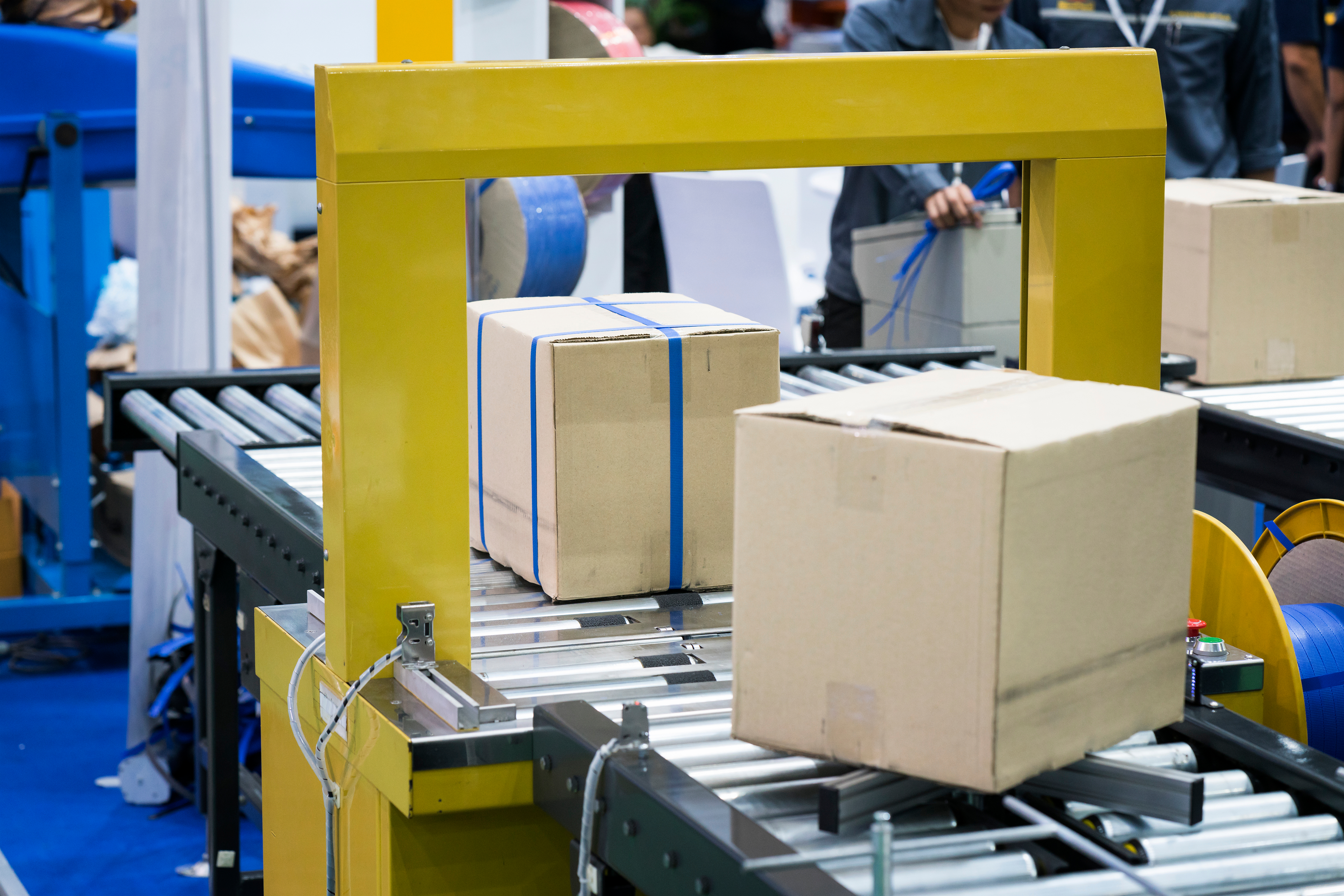 packages going through a labeling station