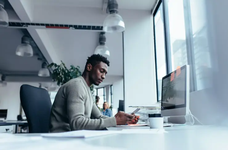 Professional-Male-Working-at-Contemporary-Desk-Modern-Computer