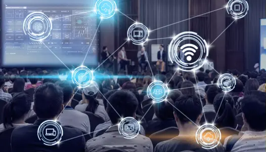Wireless communication connecting of smart city Internet of Things Technology over Abstract blurred photo of conference hall or seminar room with attendee background, technology with education concept