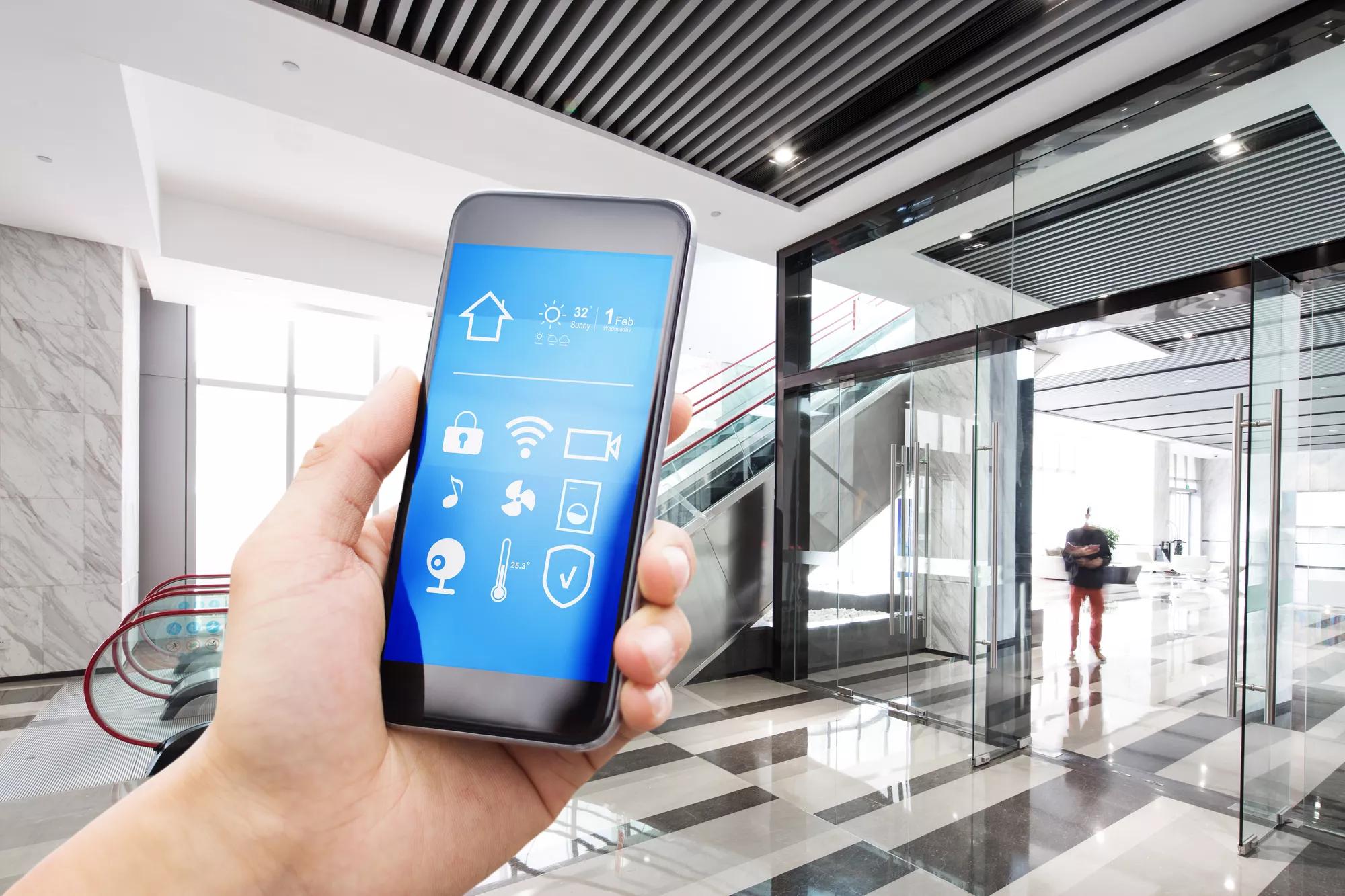 smart phone with smart home in spacious center of business building