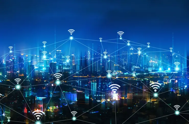 Wireless network and Connection technology concept with Bangkok city background at night in Thailand, panorama view