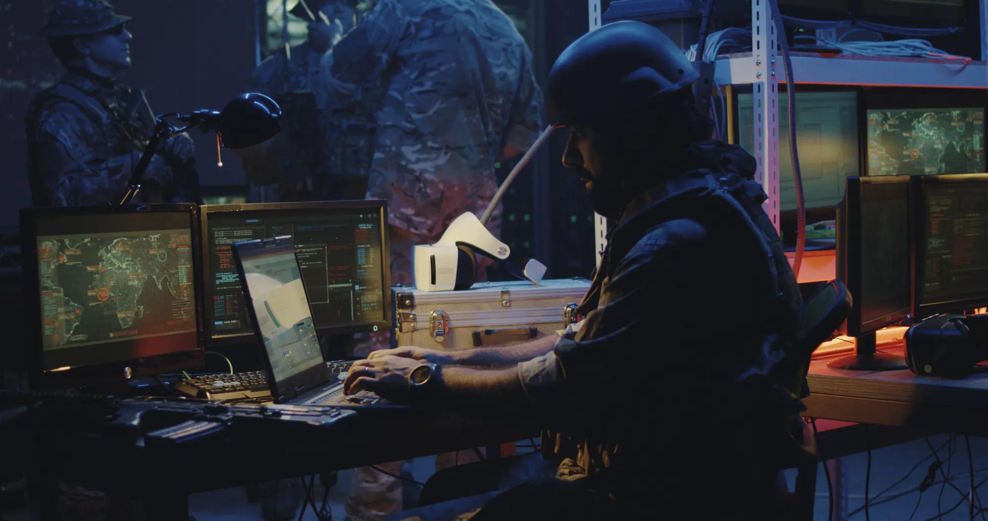 Soldier working on a laptop