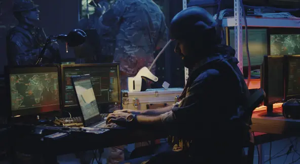 Soldier working on a laptop