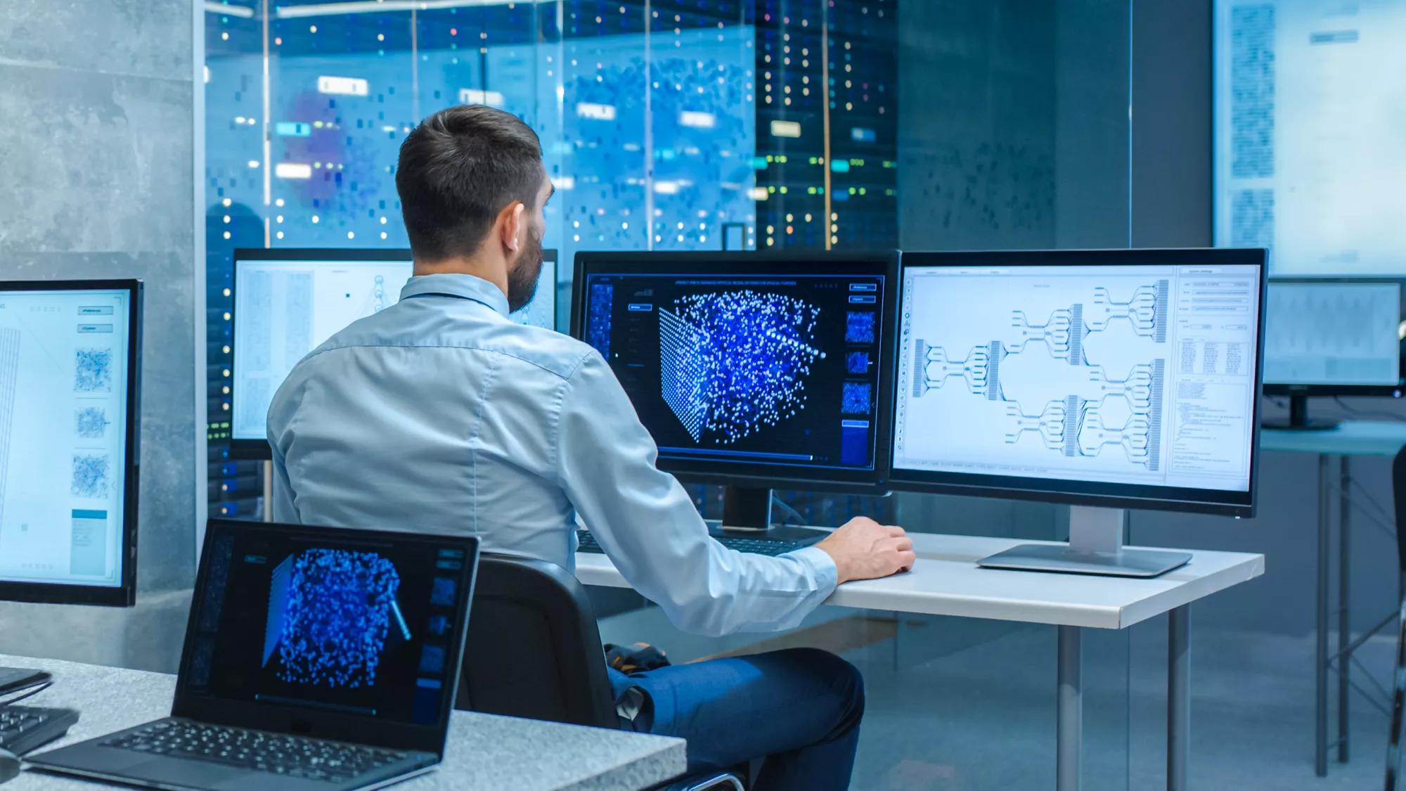 Male computer engineer monitoring network performance