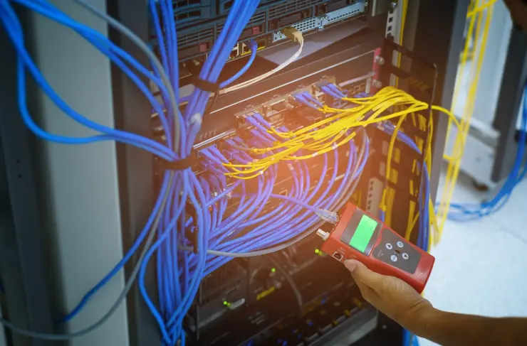 network tester tools and system administrators will test the network cable in network data center room