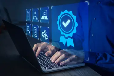Certification and standardization process, quality assurance and conformity to international standards. Concept with icons for certificate, approval, compliance to requirements. Person using computer