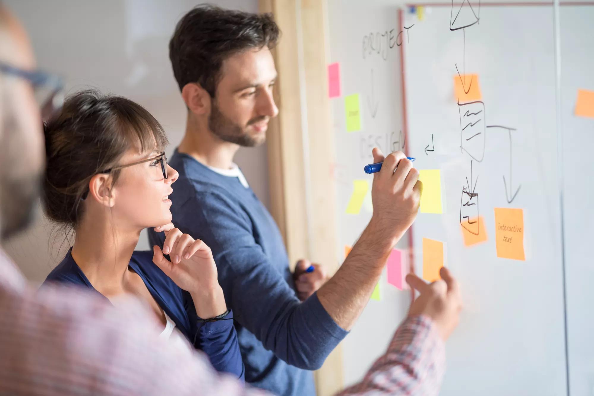 Modern-Team-Collaborating-Whiteboard-Surface