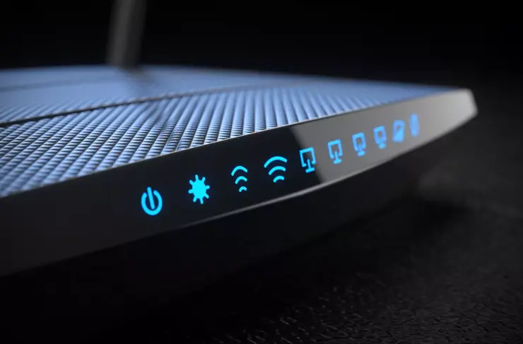 Wi-Fi wireless internet router on dark background 3d