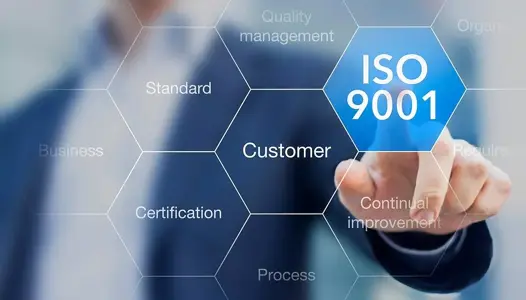 ISO 9001 certification, blurred image of male pointing to ISO 9001 logo on virtual grid