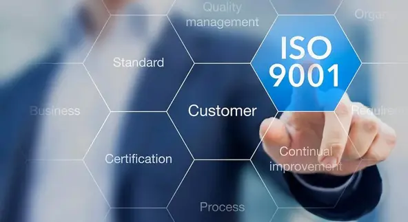 ISO 9001 certification, blurred image of male pointing to ISO 9001 logo on virtual grid
