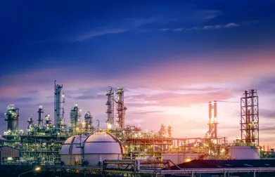 oil and gas refinery plant or petrochemical industry on sky sunset background, factory with evening, manufacturing of petrochemical industrial