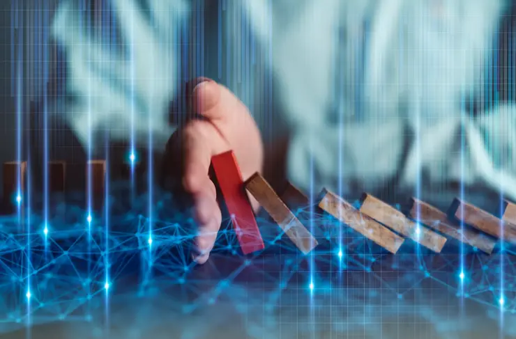 business disruption ideas concept man hand stop falling down of wood block with digital infographic double exposure 
