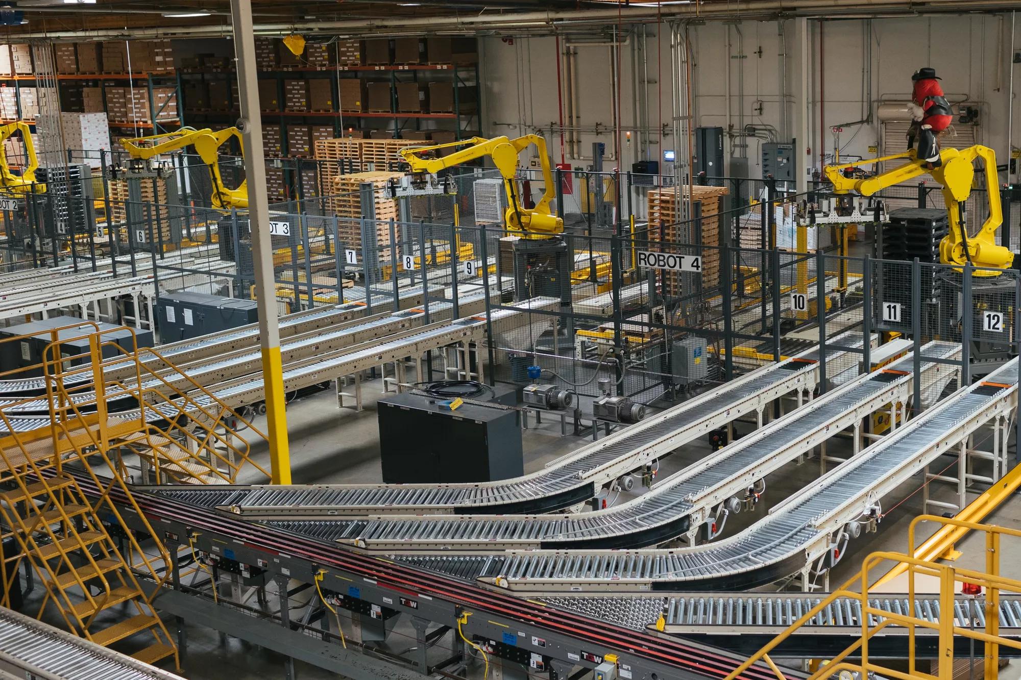 Fairfield, CA - September 3, 2022: Conveyor belts with robots to automate part of the process inside the Jelly Belly factory.