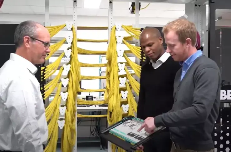 belden technical experts work with customer at belden fiber innovation center