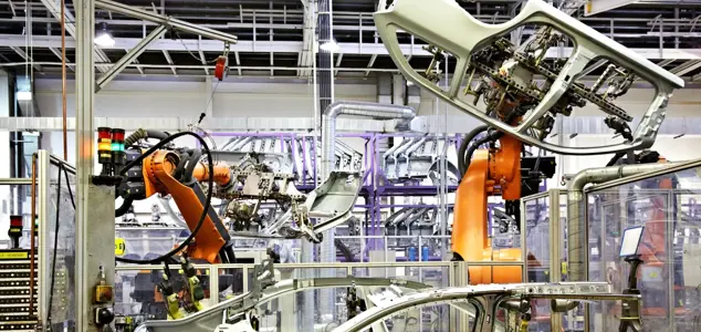 industrial robots operating on automotive assembly line.