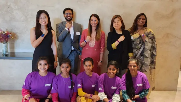 Leah with Belden employees