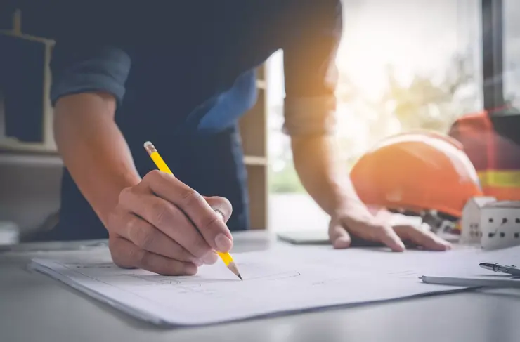 Contractor-Architect-Hardhat-Working-Blueprint