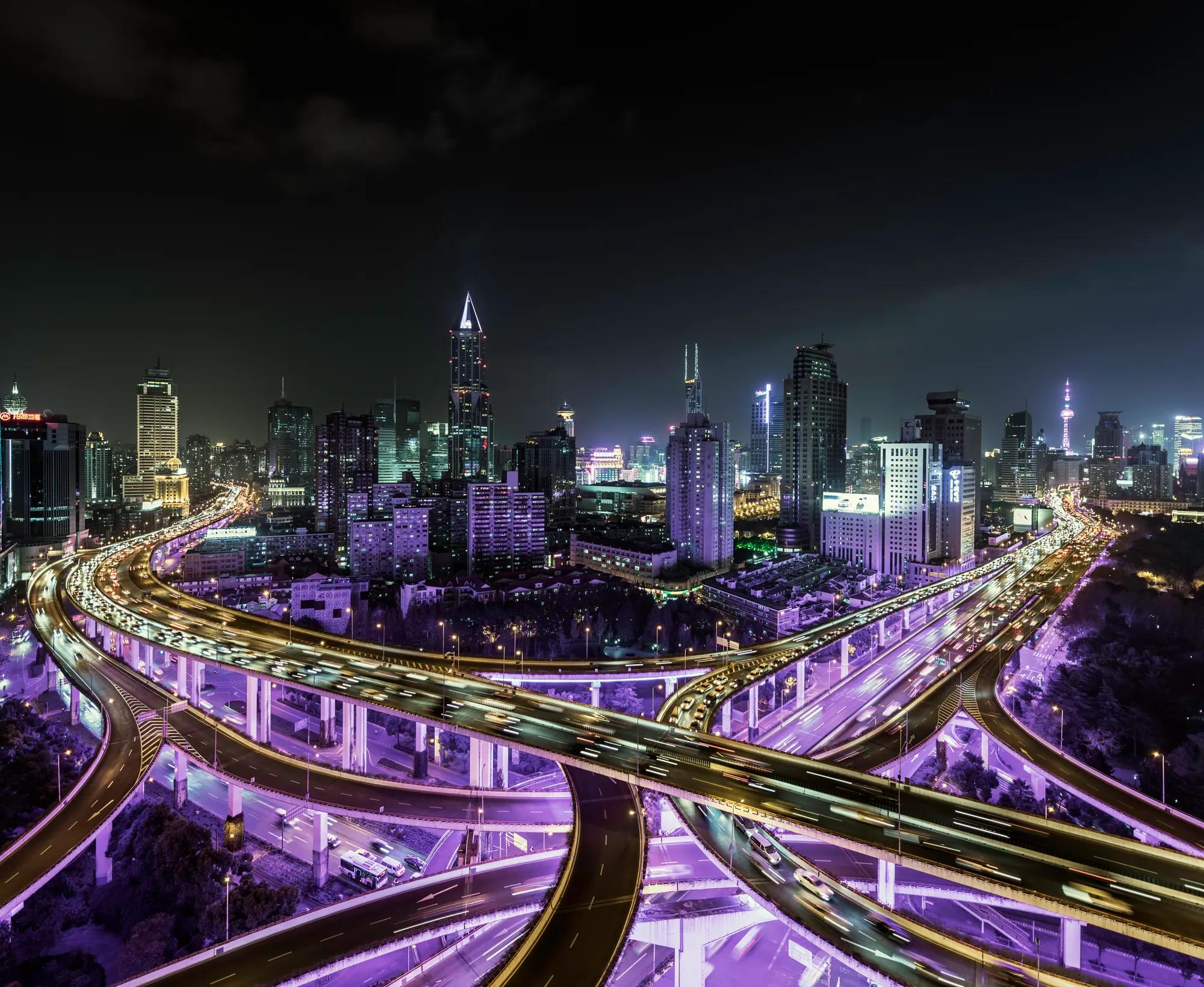 Shanghai busy road intersection at night