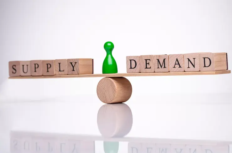 Words Demand And Supply Wooden Block Balancing On Seesaw