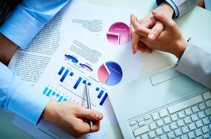 Business-Ariel-View-Laptop-Analytics-Paperwork