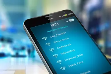 smart phone screen closeup with available wi-fi networks on soft out-of-focus background