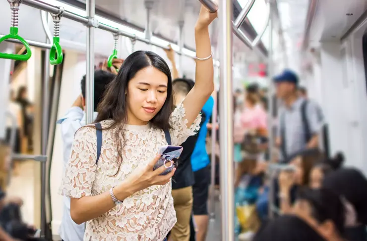 Asian-Female-Rail-Commuter-Mass-Transit