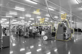 manufacturing facility in greyscale with yellow energy icons and lines